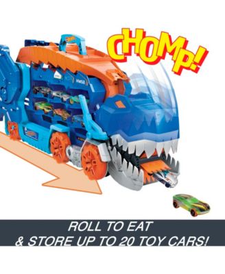 Hot Wheels City Ultimate Hauler, Transforms Into A T-Rex with Race Track, Stores 20 Plus Cars image number null