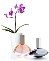 Receive a Complimentary Orchid with any large spray purchase from the euphoria Calvin Klein fragrance collection