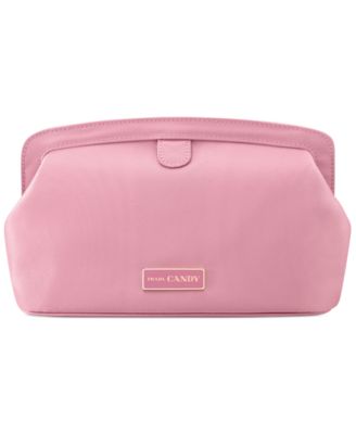 Receive a Complimentary Signature Pouch with large spray purchase from the Prada Candy fragrance collection