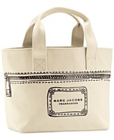 Receive a Complimentary Mini Tote Container with any large spray purchase from the Marc Jacobs fragrance collection