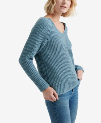 white sweater jeans outfit