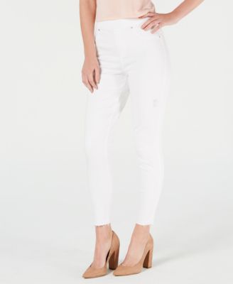 white distressed skinny jeans spanx