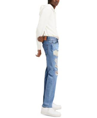 levi 501 ripped jeans mens