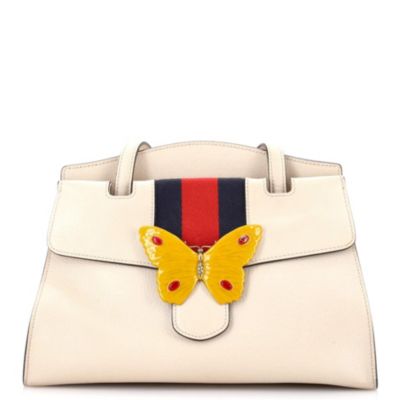 Бывшая в употреблении сумка Gucci Medium Totem с верхней ручкой из кожи коричнево-бежевого цвета