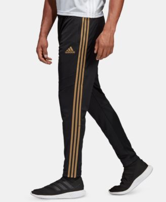 gold adidas track pants