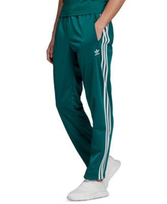 green adidas track pants mens