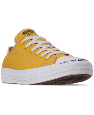 yellow low top chuck taylors