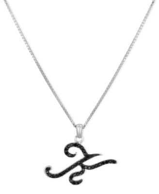 silver necklace with black pendant