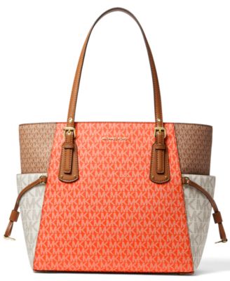 voyager east west leather tote