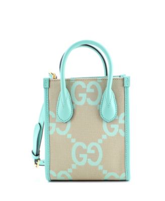 Бывшая в употреблении сумка Gucci Mini Vertical Tote Jumbo GG Canvas зеленого цвета