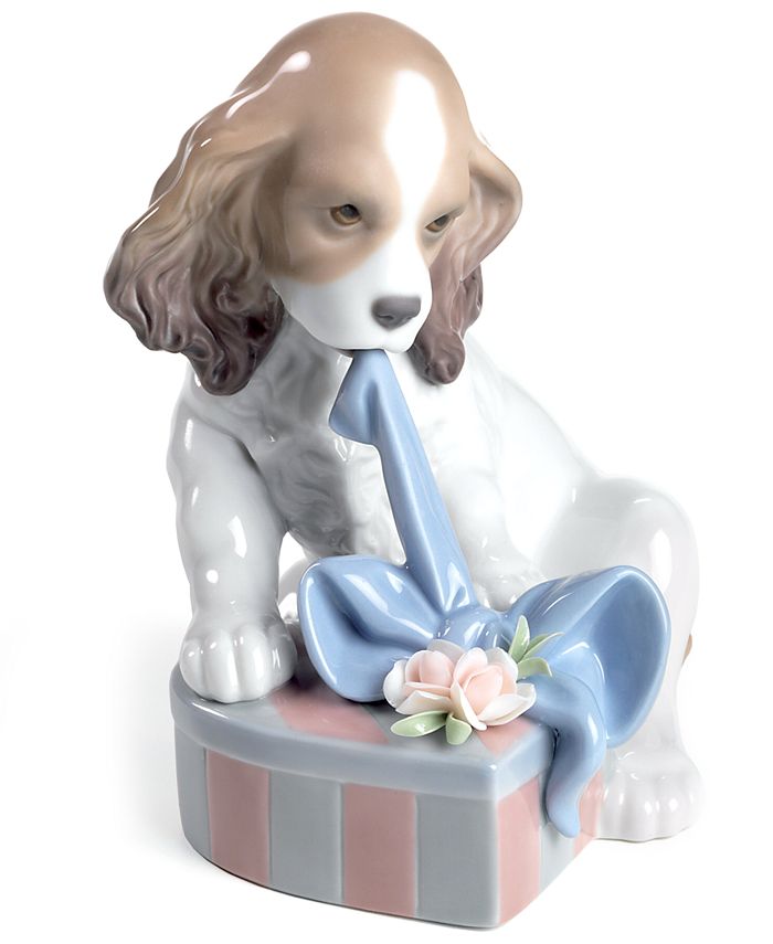 lladro dog with flowers