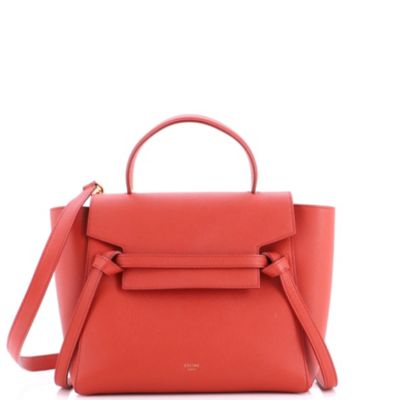 Бывшая в употреблении поясная сумка Celine Micro из текстурированной кожи красного цвета