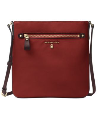 kelsey signature east west small crossbody