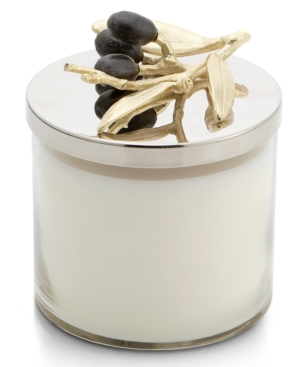 A universal symbol of peace and calm, the olive branch is featured on this elegant soy wax candle from Michael Aram. Its handcrafted detailing and oxidized finish create a timeless treasure, while scents of olive tree, verbena, squash blossom and lush spices offer a serene escape.