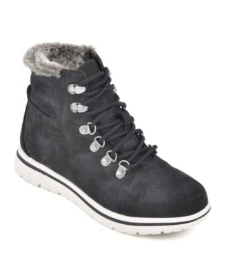 cliffs by white mountain black boots