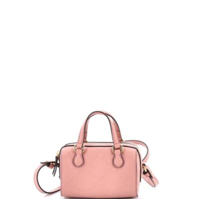 Бывшая в употреблении сумка Gucci Super Mini Convertible Boston из тисненой кожи Jumbo GG розового цвета