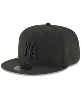 black fitted hat