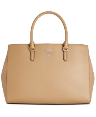 circular push lock crossbody bag