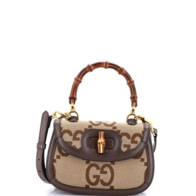 Бывшая в употреблении маленькая бамбуковая сумка Gucci 1947 года выпуска с верхней ручкой Jumbo GG Canvas коричневого цвета